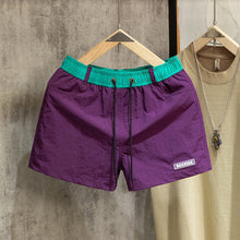 Load image into Gallery viewer, Loose-fit Color-block Beach Shorts with Lining