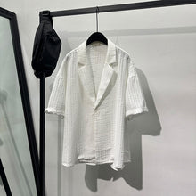 Load image into Gallery viewer, Embossed Pattern Solid Color Lapel Shirt