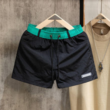 Load image into Gallery viewer, Loose-fit Color-block Beach Shorts with Lining