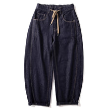 Load image into Gallery viewer, Scimitar-cut Denim Carrot Pants
