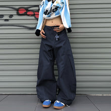 Load image into Gallery viewer, American Retro Inverted Design Embroidered Scimitar Jeans
