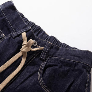 Scimitar-cut Denim Carrot Pants