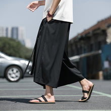 Load image into Gallery viewer, Fake Two-piece Thin Strappy Loose Pleated Pants
