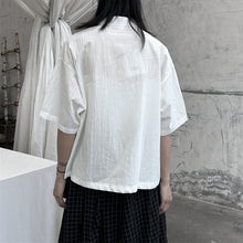 Load image into Gallery viewer, Slanted Buttoned Solid Color Irregular Shirt
