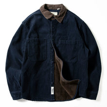 Load image into Gallery viewer, A dark navy blue corduroy overshirt with a brown corduroy collar and a brown fleece lining, shown on a plain white background.
